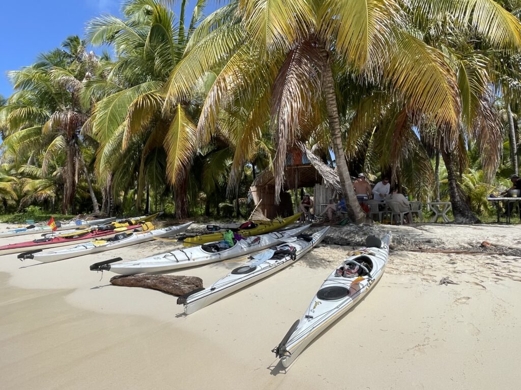 Kayakers stoping for lunch on the San Blas Islands in Panama.